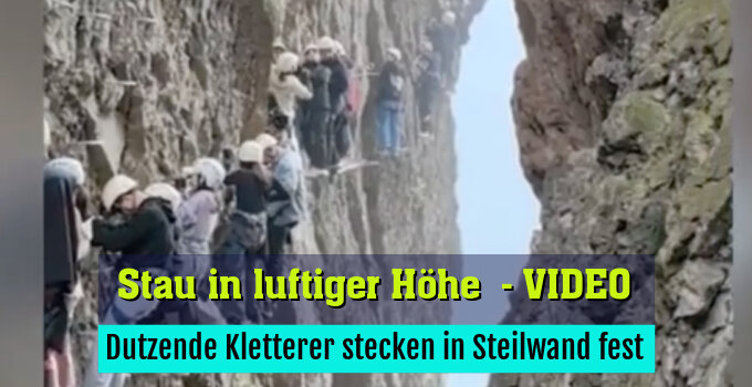 Dutzende Kletterer stecken in Steilwand fest