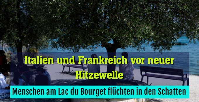 Menschen am Lac du Bourget flüchten in den Schatten