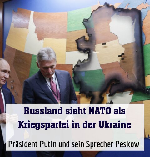 Präsident Putin und sein Sprecher Peskow (rechts)