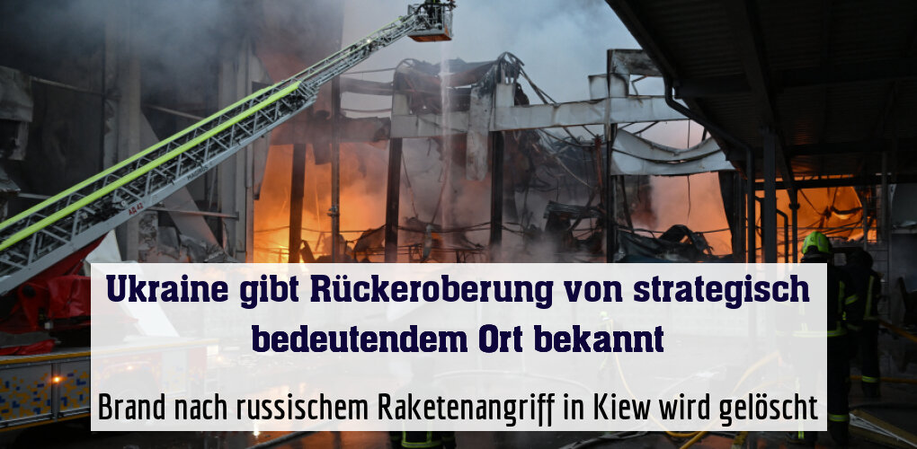 Brand nach russischem Raketenangriff in Kiew wird gelöscht