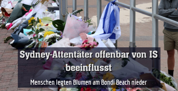 Menschen legten Blumen am Bondi Beach nieder