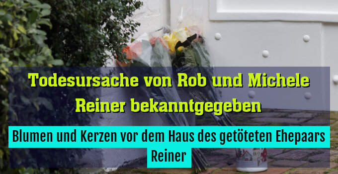 Blumen und Kerzen vor dem Haus des getöteten Ehepaars Reiner