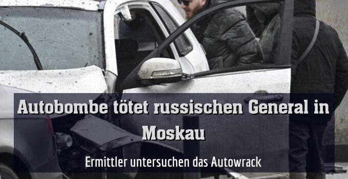 Ermittler untersuchen das Autowrack