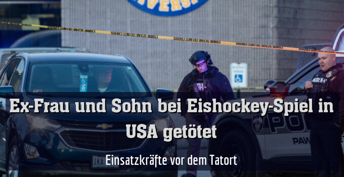 Einsatzkräfte vor dem Tatort