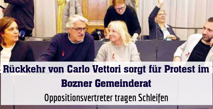 Oppositionsvertreter tragen Schleifen