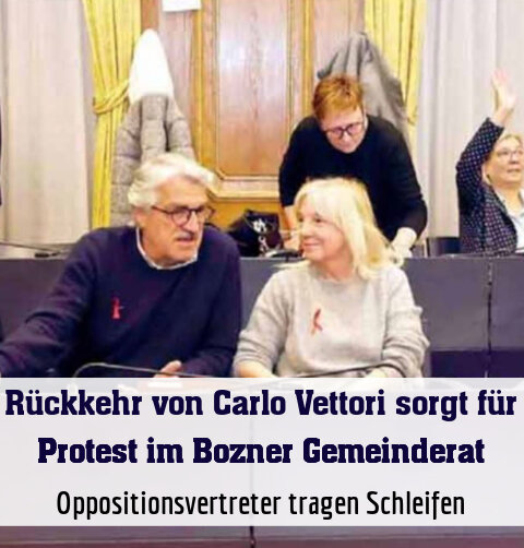 Oppositionsvertreter tragen Schleifen