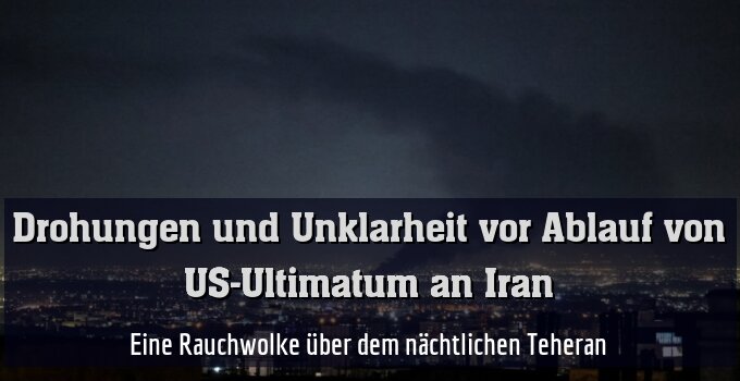 Eine Rauchwolke über dem nächtlichen Teheran