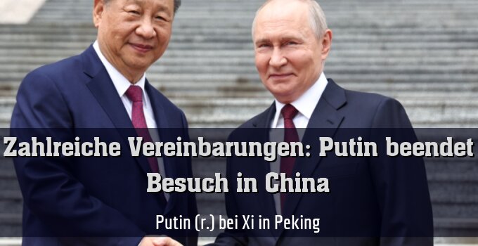 Putin (r.) bei Xi in Peking