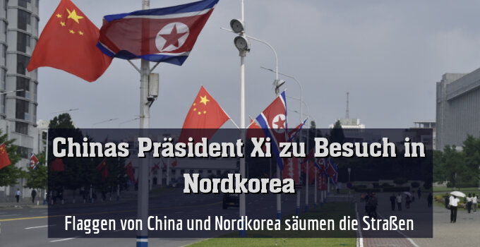 Flaggen von China und Nordkorea säumen die Straßen