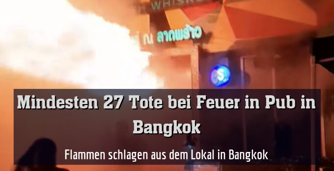 Flammen schlagen aus dem Lokal in Bangkok