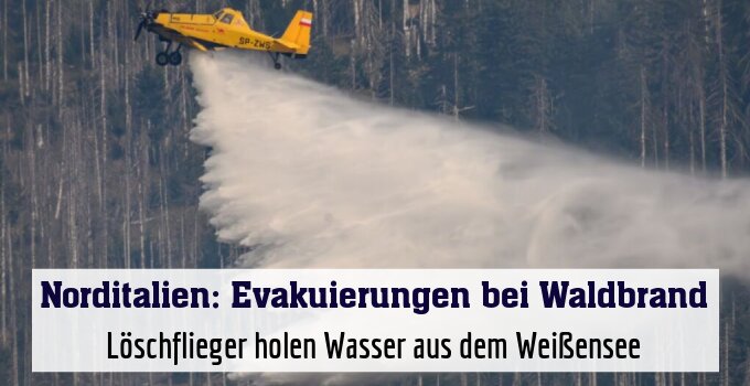 Löschflieger holen Wasser aus dem Weißensee