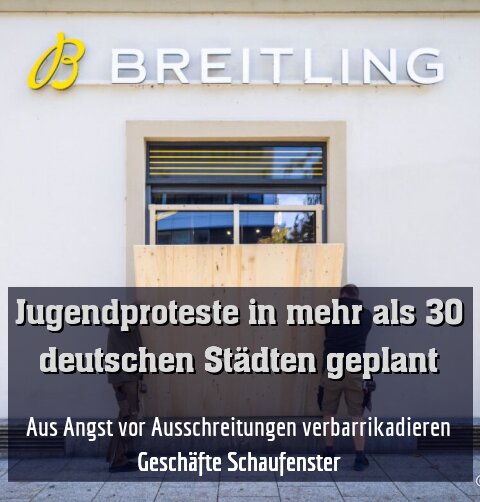 Aus Angst vor Ausschreitungen verbarrikadieren Geschäfte Schaufenster