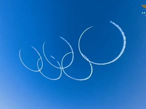 Frecce Tricolori zaubern Olympische Ringe in den Himmel