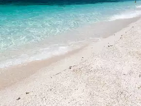 Letzten Wunsch ihrer Mutter erfüllt und 40 Kilo Sand zurückgebracht