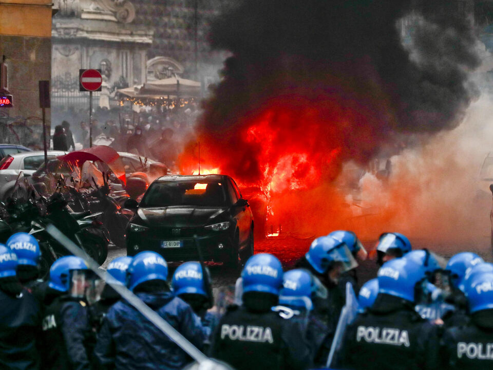 Police car set on fire during clashes with Eintracht Frankfurt\'s supporters in Naples, Italy, 15 March 2023. Napolis and Eintracht Frankfurt will play the UEFA Champions League round of 16 second leg soccer match at the Diego Armando Maradona stadium in Naples.athesiadruck2_2023031520104531_c025eea14c38b145ad5069fd1b7f39fe